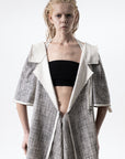 DUALITY 10-way transforming piece: coat / jumpsuit / vest / dress / 4 bags