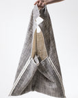 DUALITY 10-way transforming piece: coat / jumpsuit / vest / dress / 4 bags