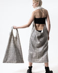 DUALITY 10-way transforming piece: coat / jumpsuit / vest / dress / 4 bags