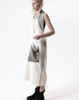 DUALITY 10-way transforming piece: coat / jumpsuit / vest / dress / 4 bags