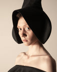 TERM 2-way transforming piece: collar/hat