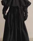 TERM 2-way transforming piece: collar/hat